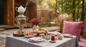 a table with food and a trophy on top of it at Xalxal Balayi Hotel in Xalxal