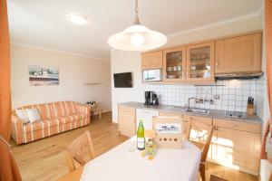 A kitchen or kitchenette at Gutshof Sinn