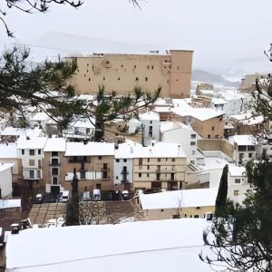 a view of a city with buildings at Casita del Castillo Mora de Rubielos in Mora de Rubielos +7 photos