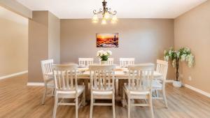 a dining room with a table and chairs at Temecula Valley 4BR - Pool Table & Fenced Yard in Winchester