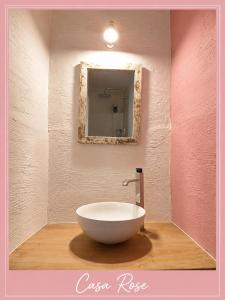 a bathroom with a large white bowl sink in a wall at Casa Rose, Petit cocon avec jardin dans un quartier calme de Toulon in Toulon +17 photos