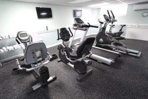 a gym with several exercise bikes in a room at Holly Tree Resort - Studio in Yarmouth