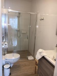 Kúpeľňa v ubytovaní Nosalove Apartamenty