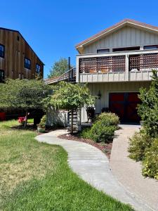 a house with a garage and a driveway at The Penthouse in Ennis +11 photos