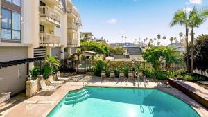 an image of a swimming pool in a apartment building at A300 - Pier View Paradise in Oceanside