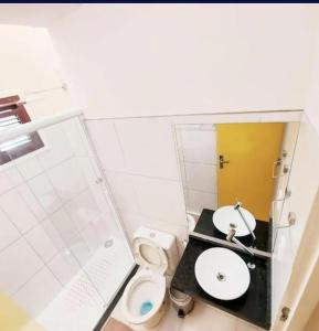 a small bathroom with a sink and a toilet at iHostel Aldeota in Fortaleza +12 photos