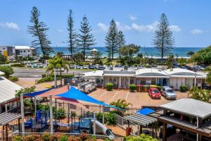 an aerial view of a parking lot at a motel at Alex Beach Resort 3BR Apt 428 in Alexandra Headland
