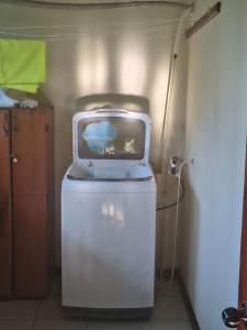 a small tv sitting on top of a machine at Drake Bay Corcovado The Monkey Trail in Drake