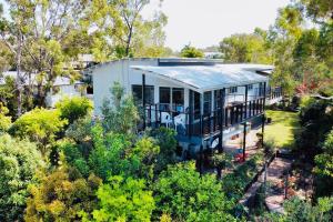 an aerial view of a house with a roof at Ocean View Koala Beach Retreat in Pottsville