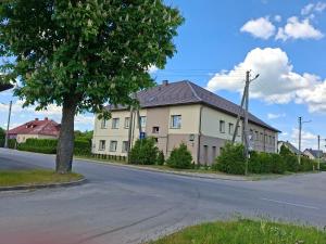 a building on the side of a road at Bed and Breakfast in Old Town in Naujoji Akmenė