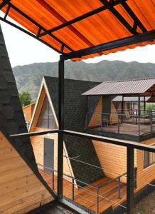 a view of a house with a roof at Tau Saty in Saty