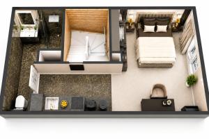 a floor plan of a room with a bed and a couch at Blakpearl Hyper Centre Gare Parking in Amiens