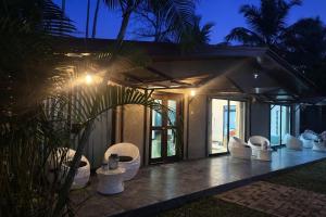a house with a bunch of toilets in front of it at Trump House in Anuradhapura