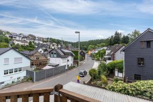 a view of a town with houses and a street at Auszeit im Grünen in Bad Schwalbach