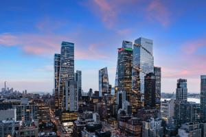 a view of a city with tall skyscrapers at Doubletree By Hilton New York Times Square West in New York +54 photos