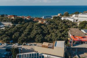 an aerial view of a city and the ocean at Ark Luxury Suite, Hot tub & Sea Views, by ZanteWize in Tragaki