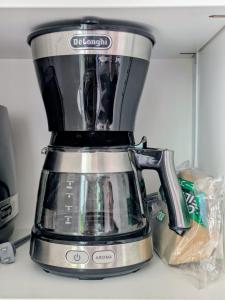 a black and silver blender sitting on top of a counter at Kamuy Chalet Hakuba by Jade Villa in Hakuba