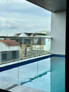 a view from the balcony of a swimming pool at MoChy Homestay in Thôn Trường Giang