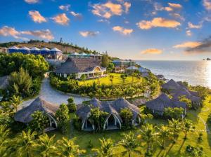 an aerial view of the resort and the ocean at Blue Haven Resort Quy Nhơn in Quy Nhon