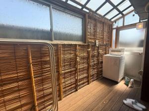 a bathroom with a heater and a window and a heater at sano no yado - 佐野の宿 - in Sano +50 photos