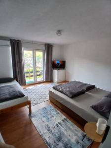 Postel nebo postele na pokoji v ubytování Apartment View