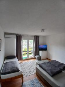 Postel nebo postele na pokoji v ubytování Apartment View