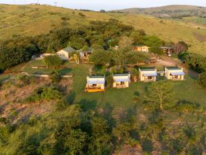 an aerial view of a house on a hill at Sunset Safari Camp at Hluhluwe Game Park in KwaNompondo