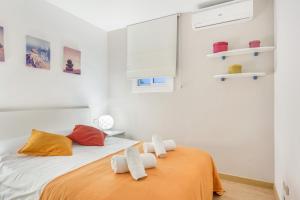 A bed or beds in a room at Apartment Link BCN Sagrada Familia