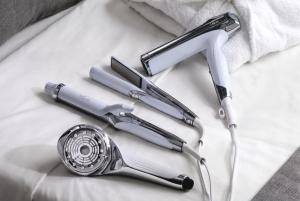 two stethoscopes sitting on top of a bed at Kurayoshi City Hotel in Kurayoshi