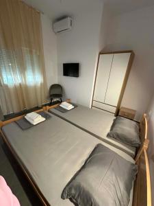 a hospital room with two beds in it at Sunset Apartment A-4 in Perea
