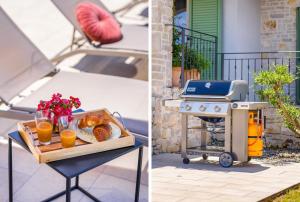 a barbecue grill with a tray of bread and orange juice at Villa Bartol in Trviž