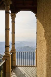 a view from a balcony with a view of the ocean at Villa Jolanda, a Garamonds Property in Brunate