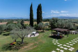 an aerial view of a garden with a gazebo and trees at Zuccherini in Buriano +36 photos