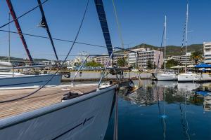 a sail boat docked at a dock in a harbor at Yacht Pipit - Unique Stay in Marina of Kavala in Kavála