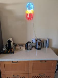 a kitchen counter with a light on top of it at Vincents Paradise in Mairena del Aljarafe