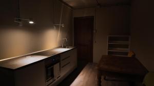 a kitchen with a sink and a counter top at Casa Rifugio Parma in Basilicanova +31 photos