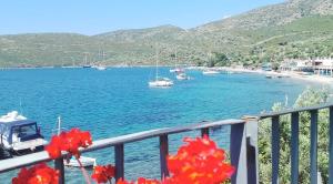 a view of a body of water with boats in it at Çökertme Butik Otel in Çökertme
