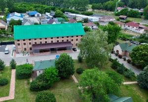 an overhead view of a building with a green roof at Heritage Hall and More in Nagykálló