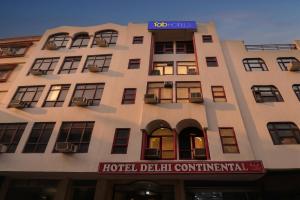 a hotel building with a hotel delhi continental sign on it at FabHotel Delhi Continental in New Delhi