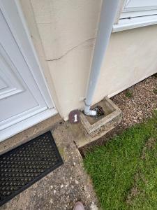 a pole on the side of a house at 1 Bedroom Chalet in West Runton