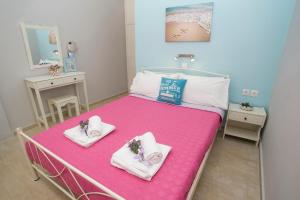 Ένα ή περισσότερα κρεβάτια σε δωμάτιο στο Votsalo Kalami Apartments