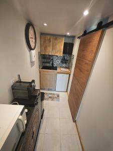 a kitchen with a stove and a counter top at Nature stopover in green Provence in Artigues