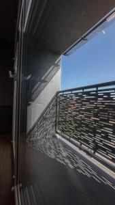 a view of a wall with a window in a building at Готель «ТАВЕРНА» in Ovruch