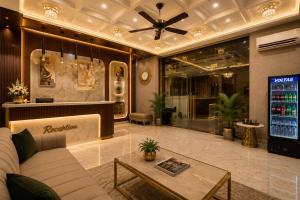 a lobby of a store with a couch and a table at Hotel Premium Suites-Free Airport Pickup in New Delhi