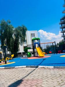 a playground with a slide at Aslan House in Nicosia