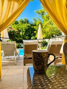 a coffee cup sitting on top of a table at Cabane la Clef des Champs au Mas des Entrages in Salon-de-Provence