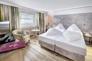 Llit o llits en una habitació de Boutique-Hotel Bauer - inklusive Joker Card 53 fotos més