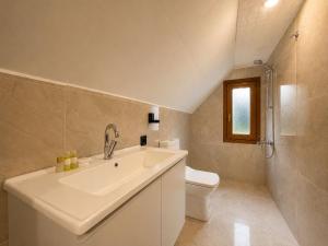 a bathroom with a sink and a toilet at Gölbaşı Garden Villa in Uzungöl +31 photos