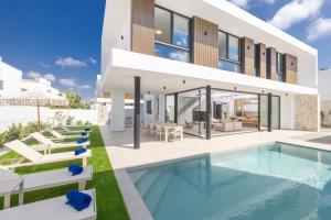 an image of a villa with a swimming pool at Ocean Whispers Villas in Paralimni