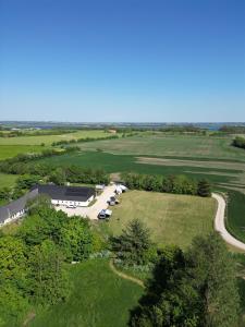 an overhead view of a golf course with a parking lot at Alpaca Bed & Fields in Snedsted
